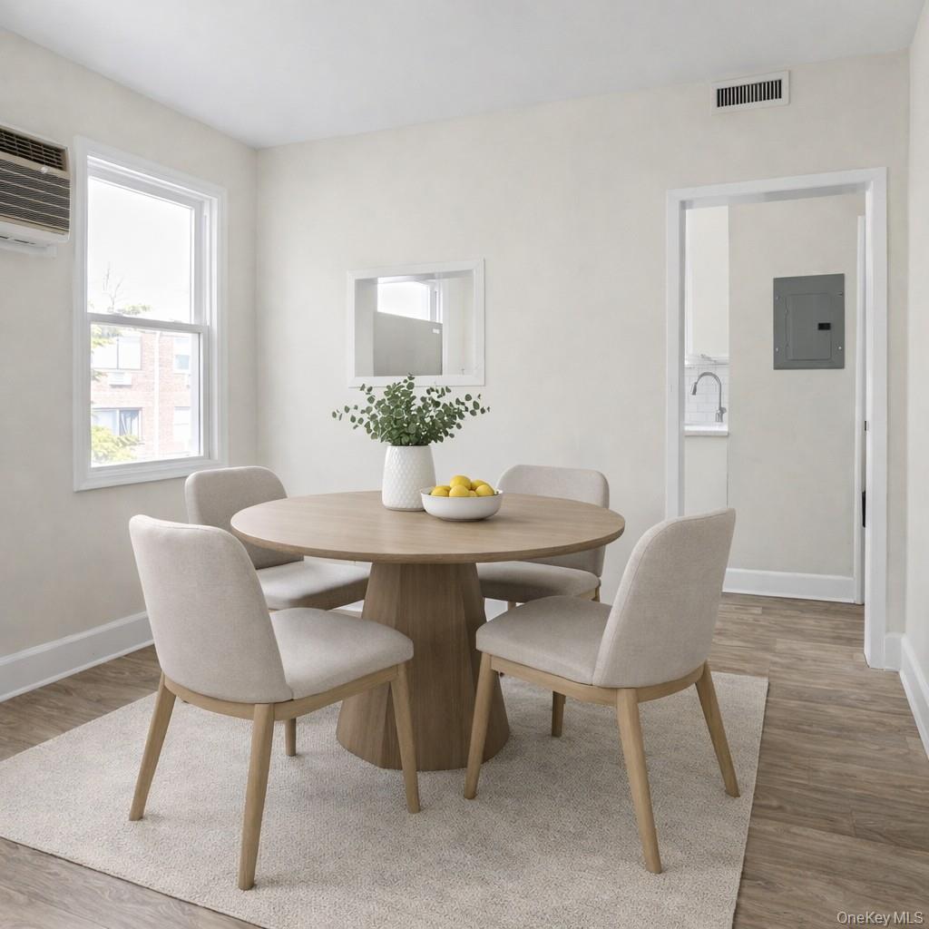 79-47 68th Road Queens, NY 11379 - Photo 16 of 29 a dining room with furniture and window