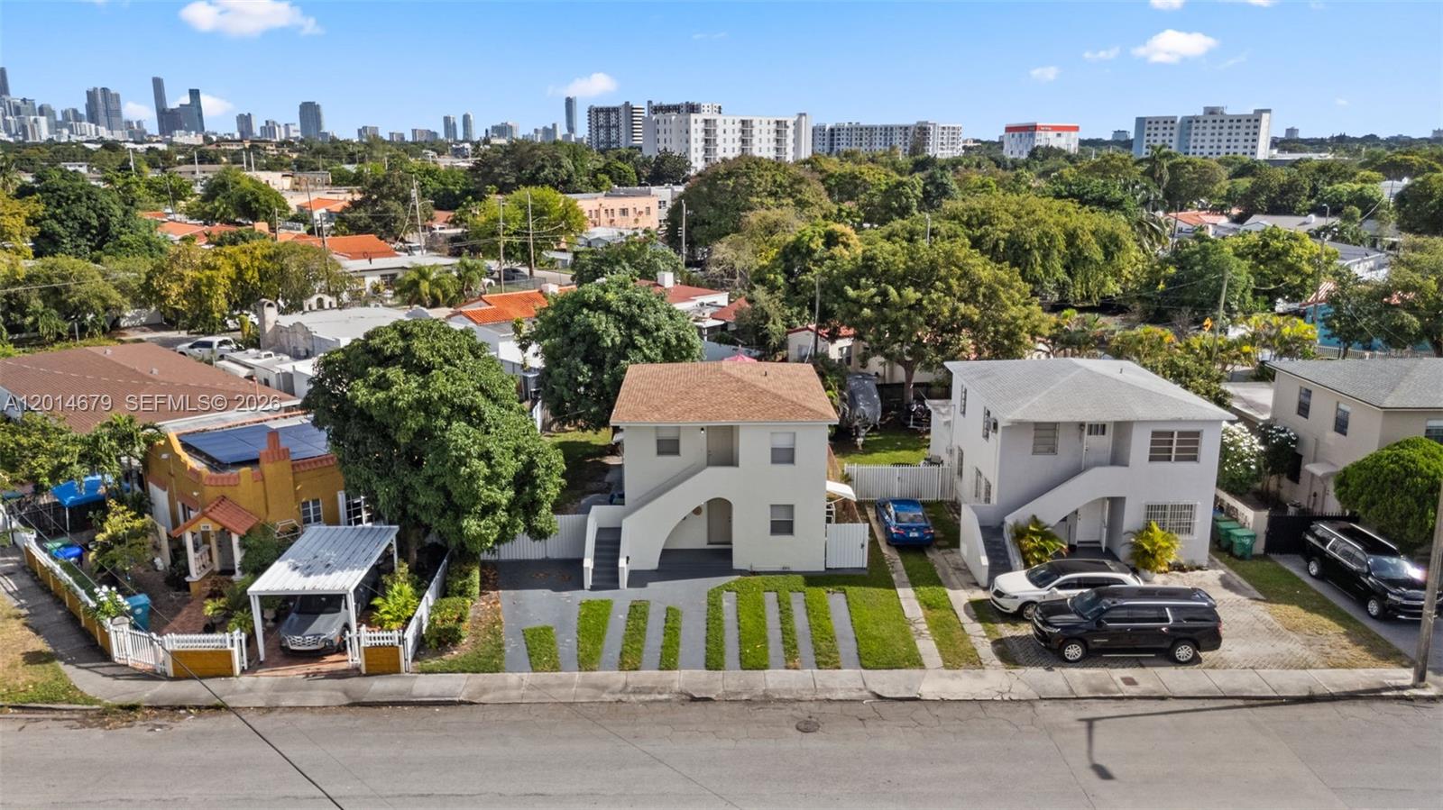 255 Beacom Boulevard, Unit DOWNSTAIRS Miami, FL 33135 - Photo 20 of 36 an aerial view of multiple houses