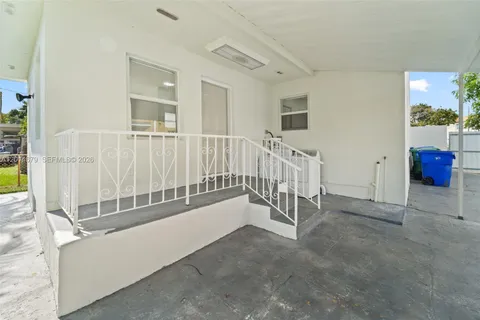 a view of a livingroom with a staircase