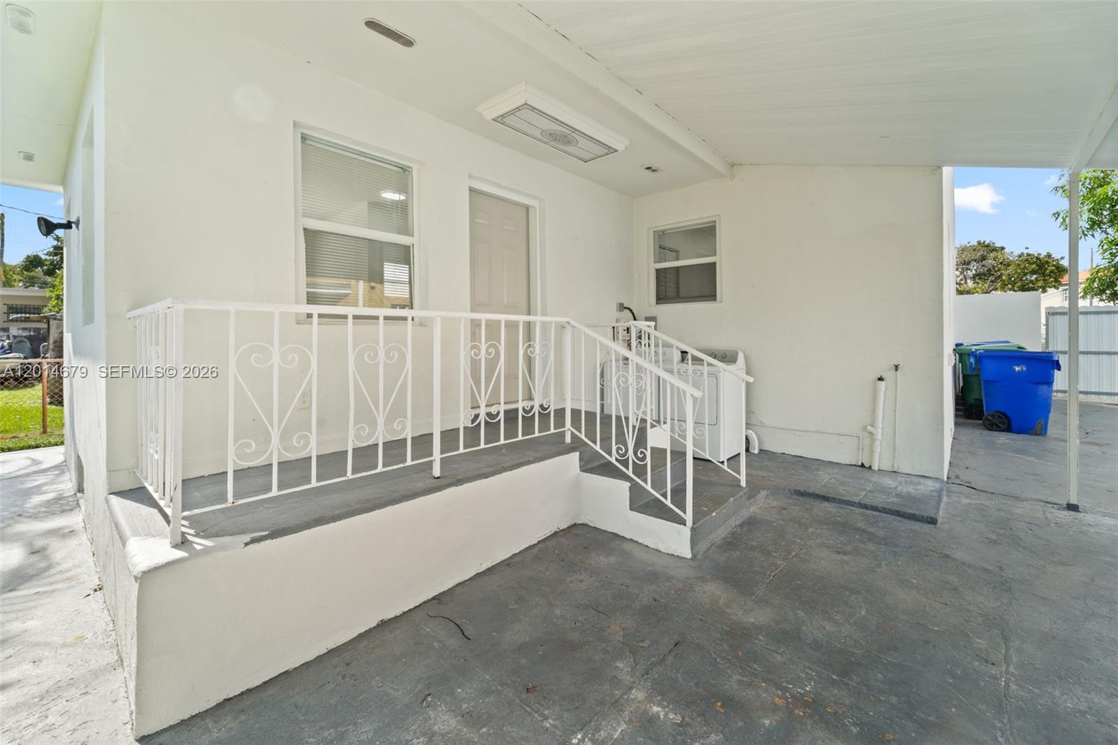255 Beacom Boulevard, Unit DOWNSTAIRS Miami, FL 33135 - Photo 35 of 36 a view of a livingroom with a staircase