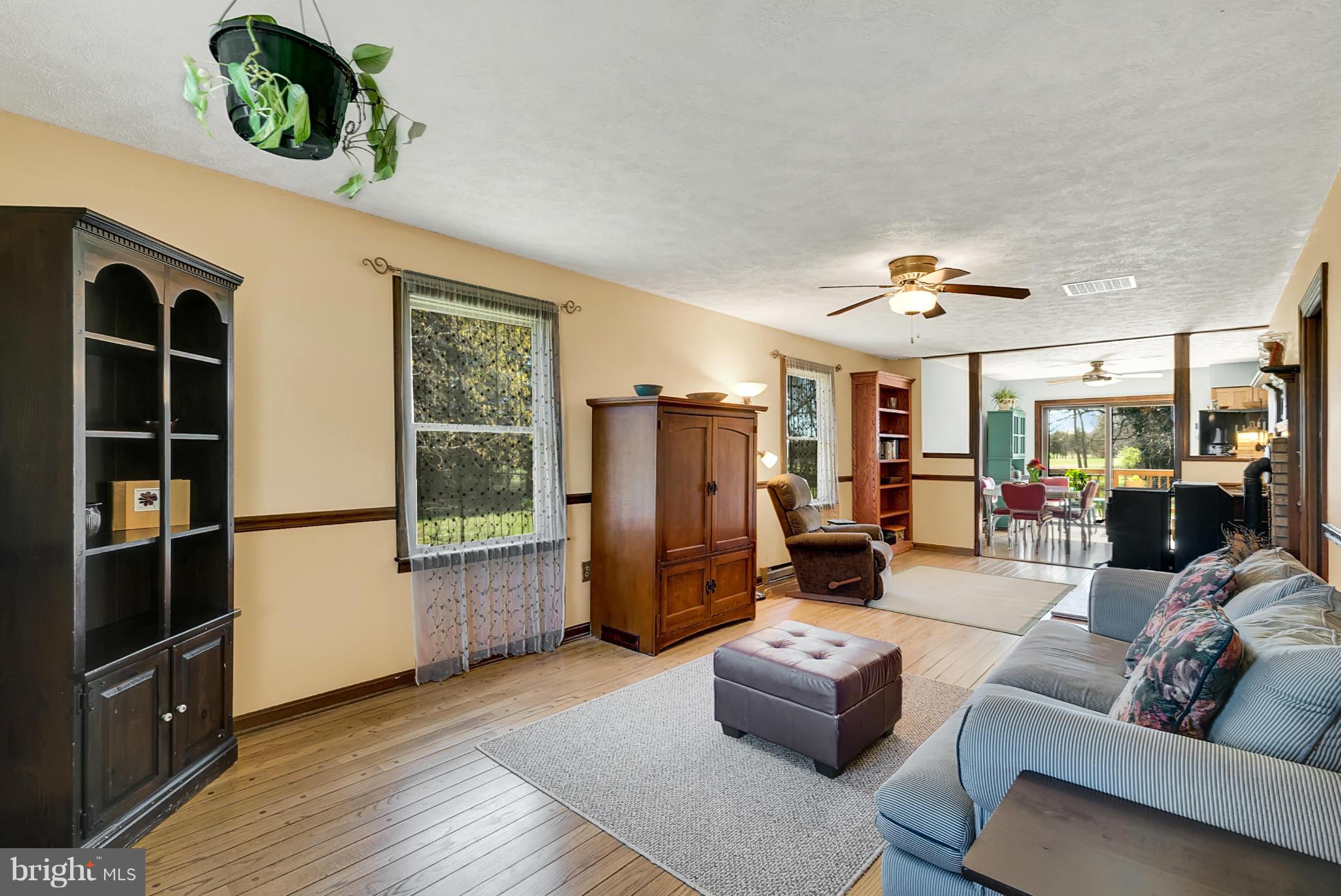 7263 Botha Road Bealeton, VA 22712 - Photo 5 of 30 Family room with wood flooring