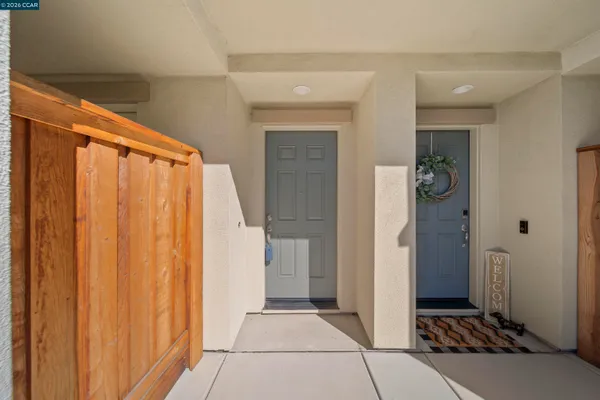 a view of a bathroom with sink and shower