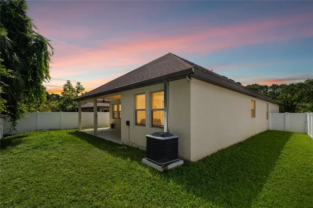 a view of a backyard with a garden