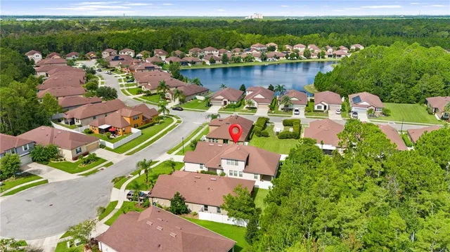 an aerial view of multiple house with outdoor space