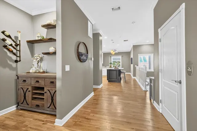 a living room with furniture and a lamp