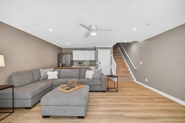 a bedroom with a bed and a flat tv screen