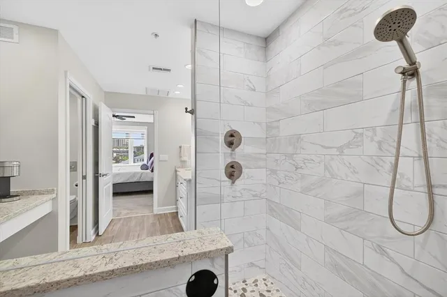 a bathroom with a sink and mirror