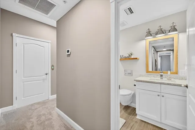 an aerial view of a house with outdoor space