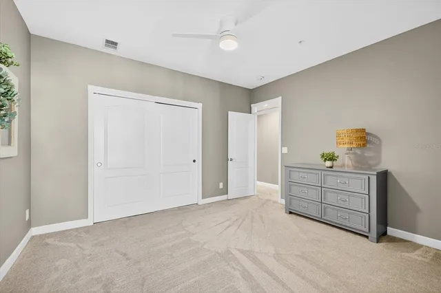 an aerial view of a house with lake view