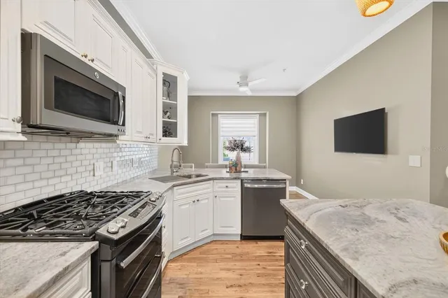 a view of a kitchen from the hallway