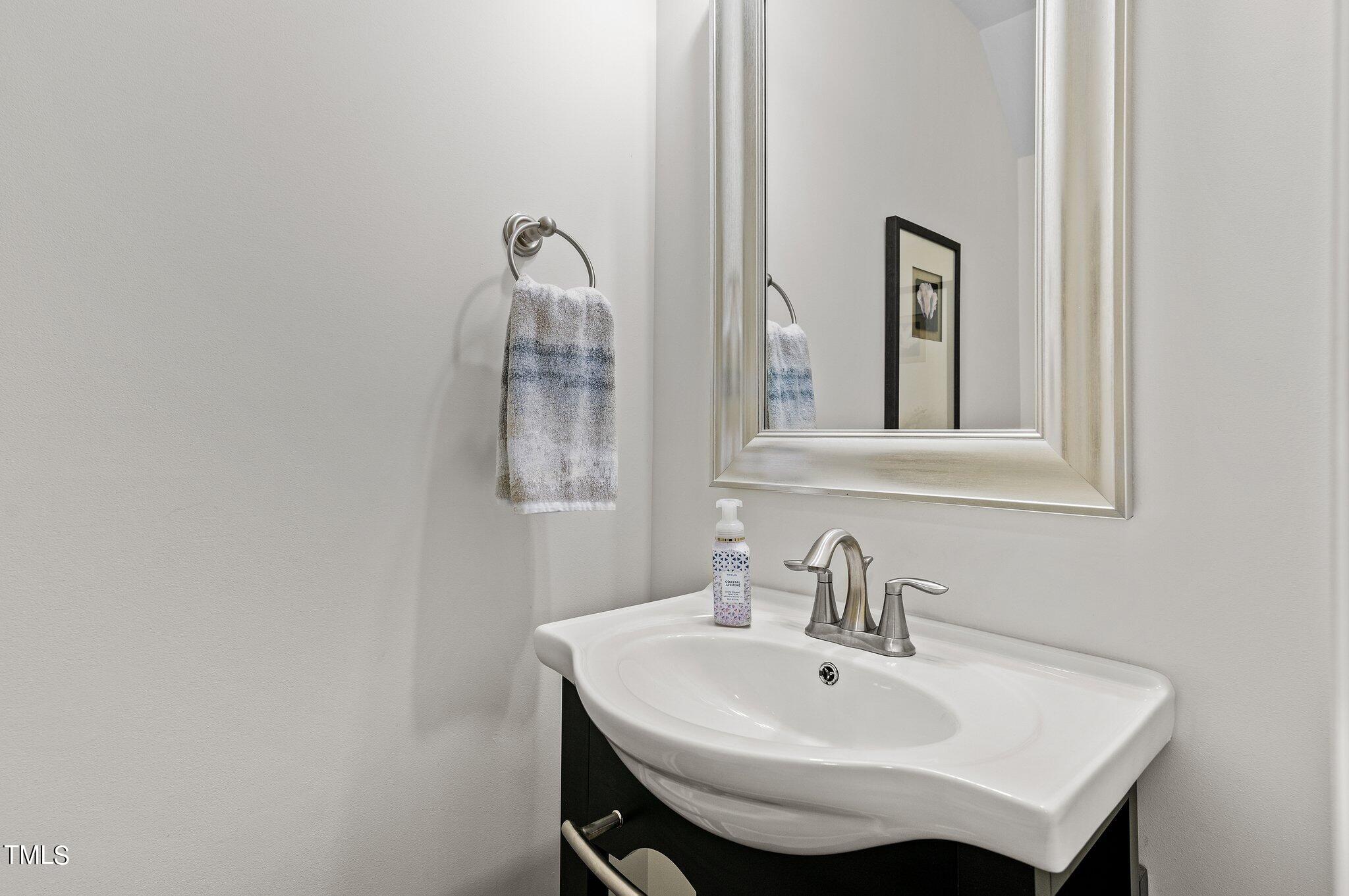 5657 Wade Park Boulevard Raleigh, NC 27607 - Photo 9 of 24 Half Bath conveniently on main level