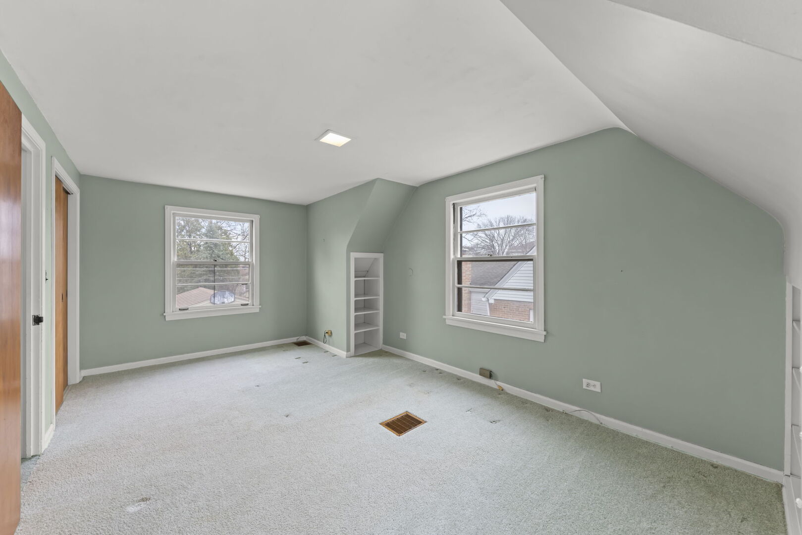 1818 East Indiana Street Wheaton, IL 60187 - Photo 14 of 29 an empty room with windows