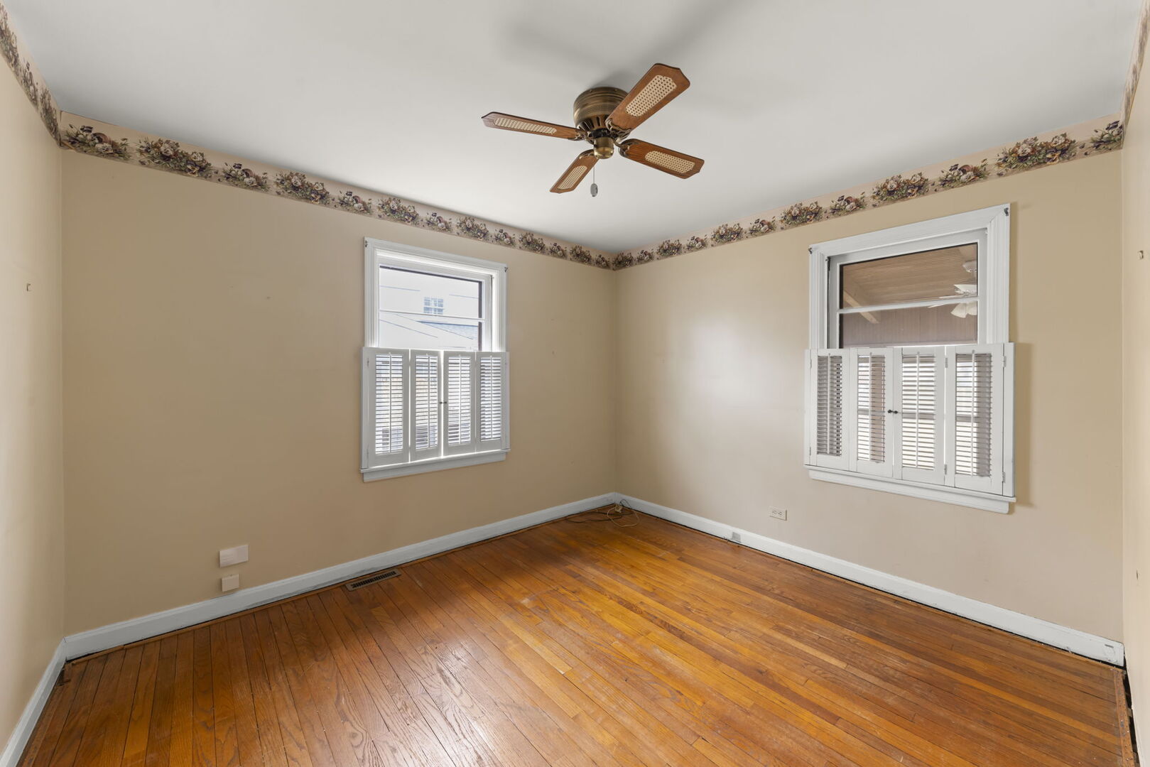 1818 East Indiana Street Wheaton, IL 60187 - Photo 16 of 29 a view of empty room with wooden floor and fan