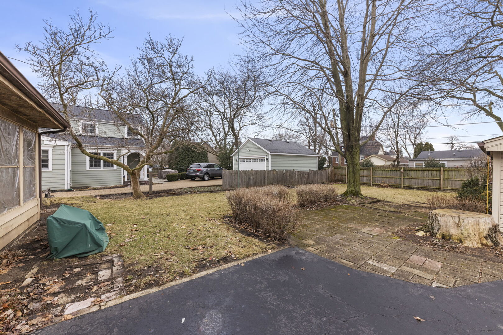 1818 East Indiana Street Wheaton, IL 60187 - Photo 22 of 29 a view of street with a yard and trees