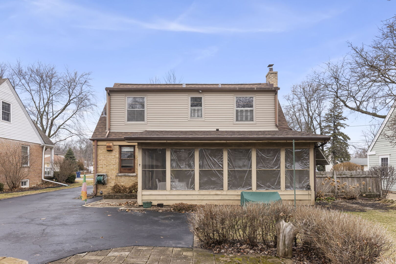 1818 East Indiana Street Wheaton, IL 60187 - Photo 25 of 29 a front view of a house with a yard