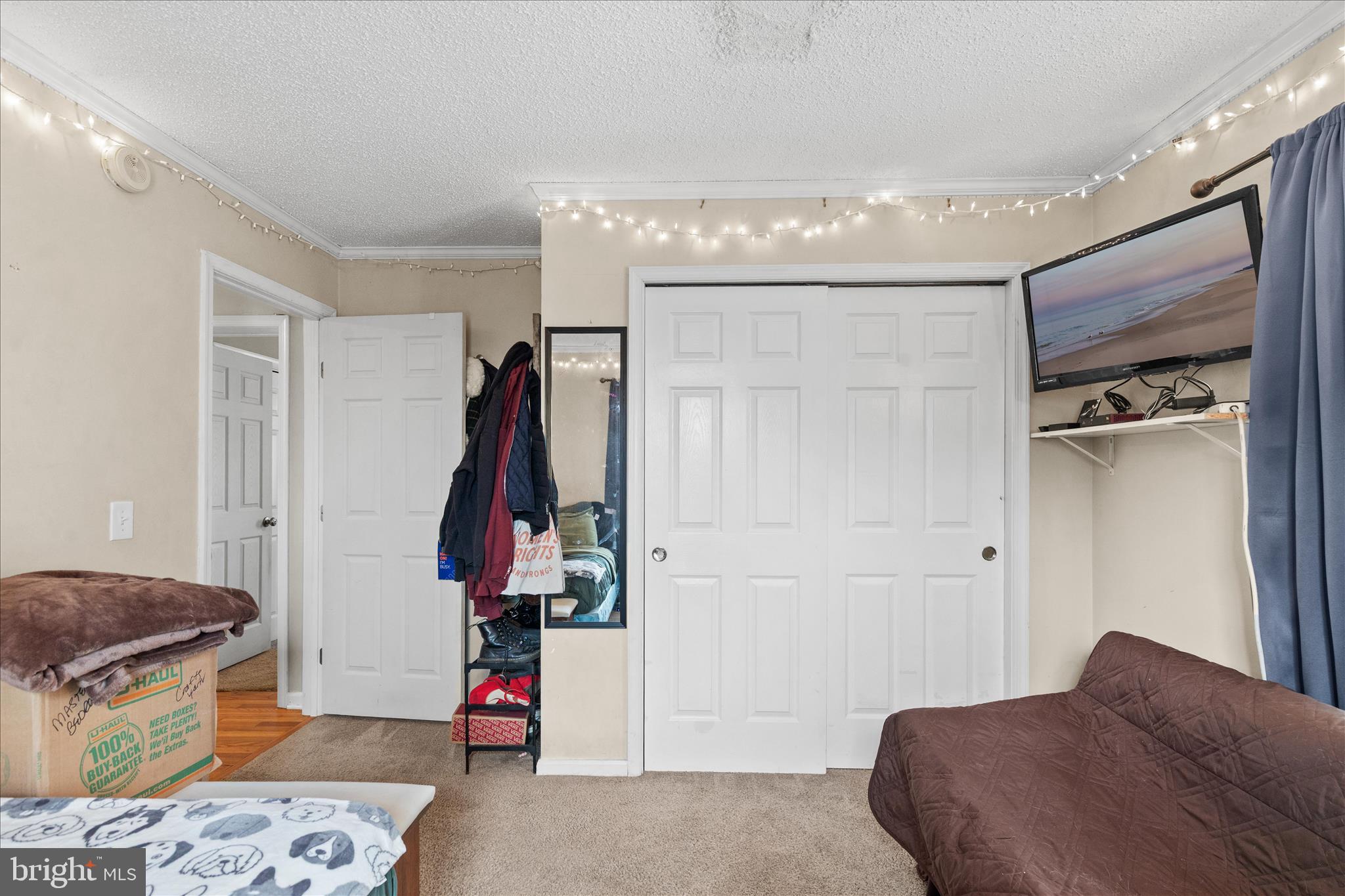 12647 Old Stage Road Bishopville, MD 21813 - Photo 32 of 84 a bedroom with a bed and wooden floor