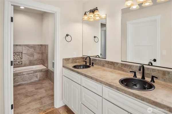 a kitchen that has a sink and a stove