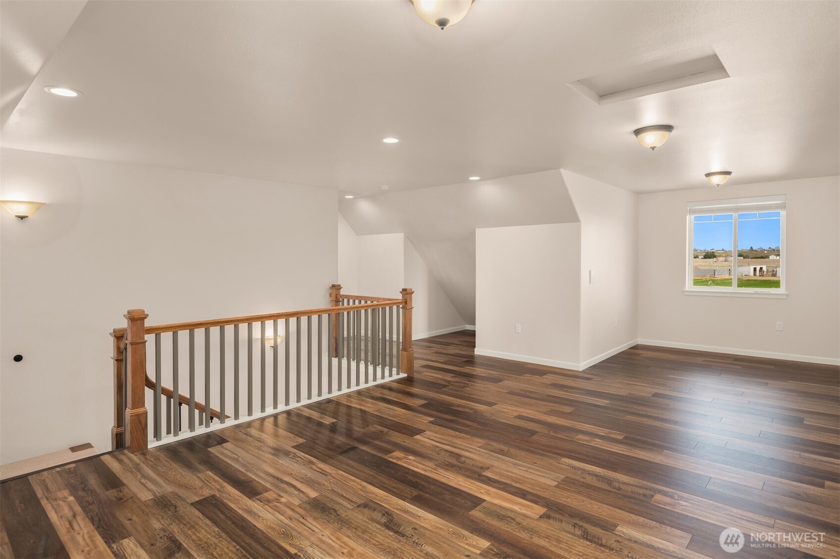 2762 Elgin Road Northeast Moses Lake, WA 98837 - Photo 21 of 37 a view of a hallway with wooden floor