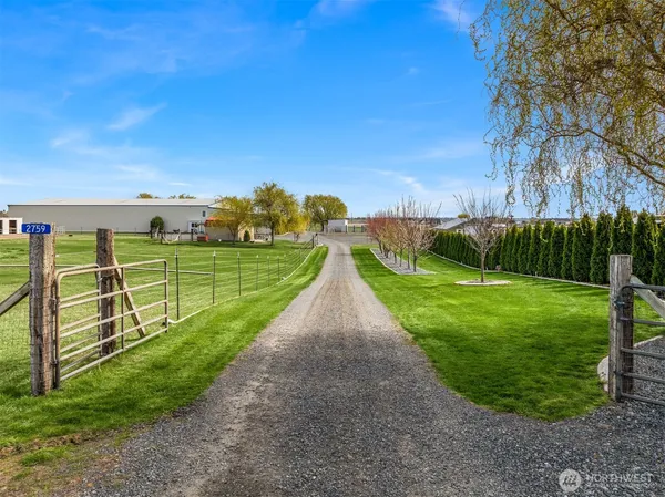 a view of a house with a street