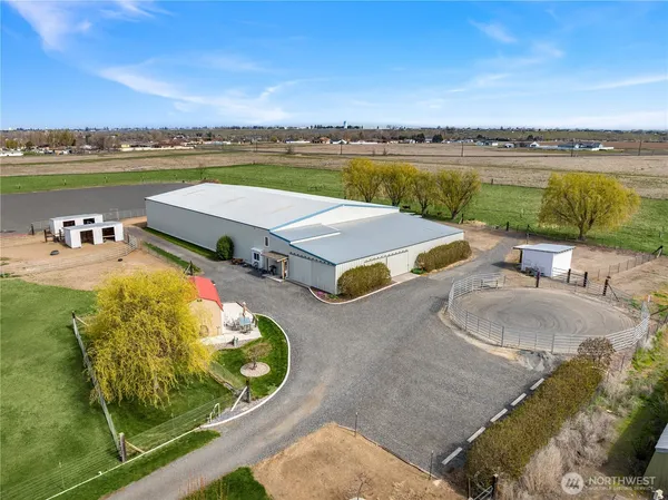 an outdoor space with furniture and garden