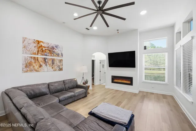 a bathroom with a toilet sink and shower