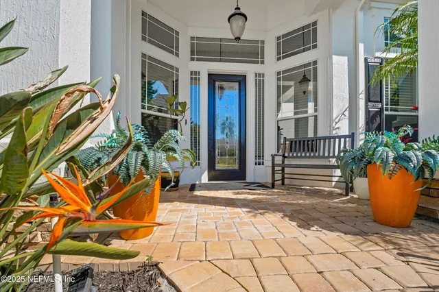 a view of a backyard with a patio