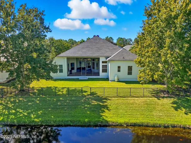 an aerial view of a house with a garden