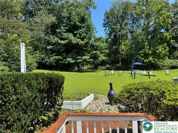 a view of a garden with a bench