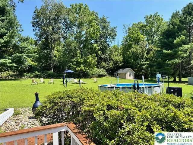 a garden view with a seating space