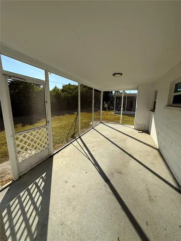 a house view with swimming pool in front of it