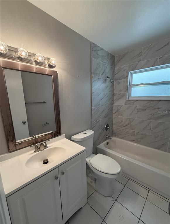 516 Briarwood Road Venice, FL 34293 - Photo 10 of 13 a bathroom with a sink a toilet and shower