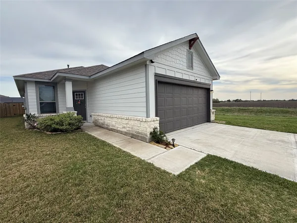 a front view of house with yard