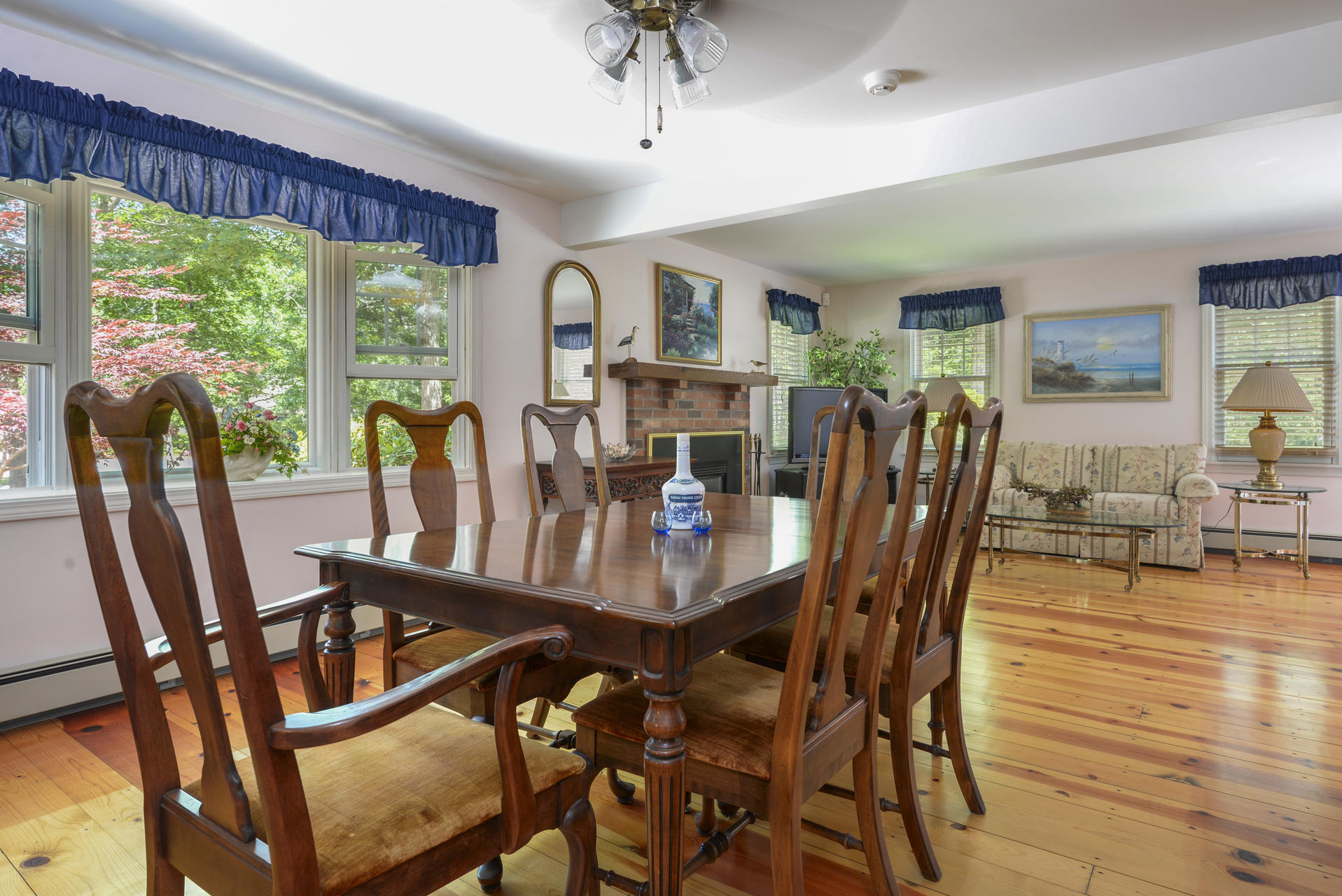 129 Oakwood Road Eastham, MA 02642 - Photo 13 of 30 a view of a dining room with furniture window and outside view