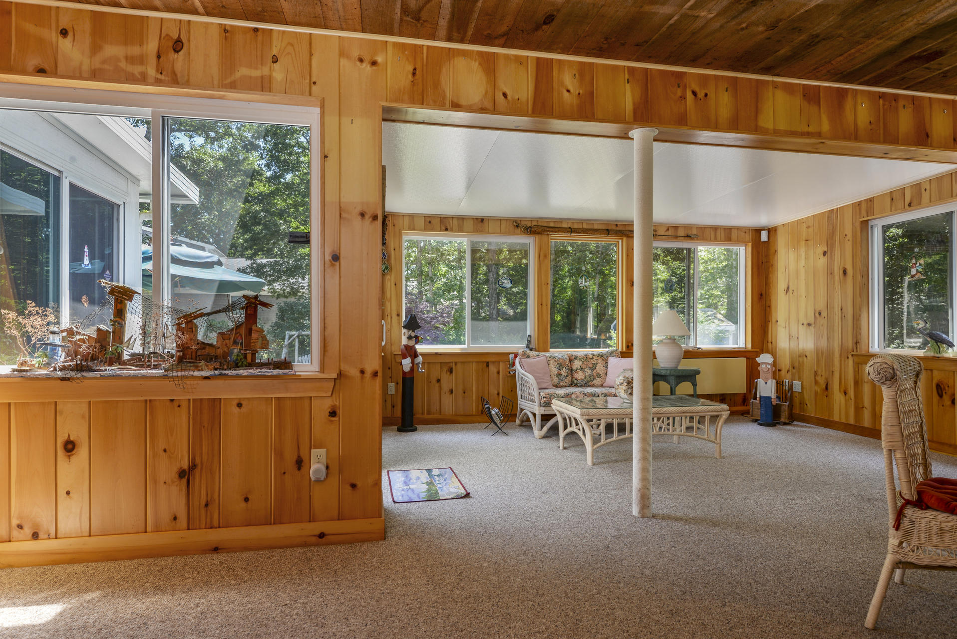 129 Oakwood Road Eastham, MA 02642 - Photo 18 of 30 a living room with furniture and a window