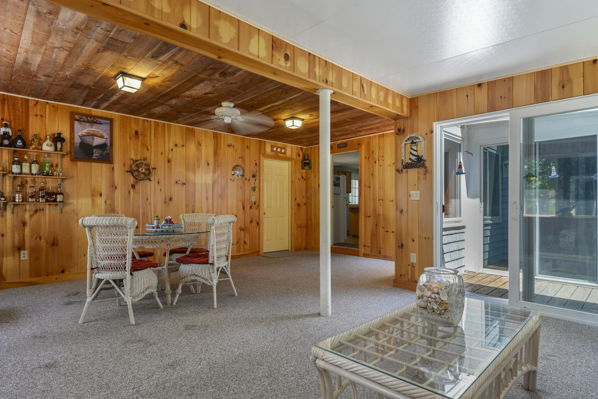 129 Oakwood Road Eastham, MA 02642 - Photo 20 of 30 a patio with a table and chairs