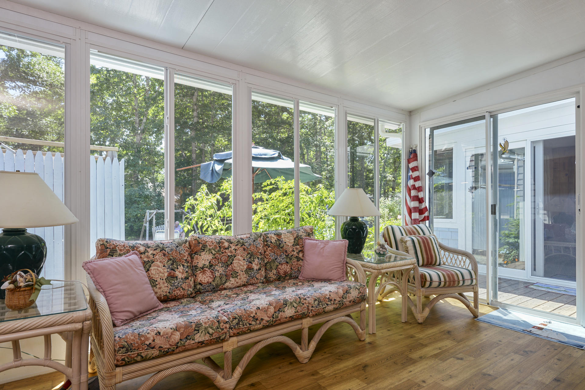 129 Oakwood Road Eastham, MA 02642 - Photo 22 of 30 a living room with furniture and a large window