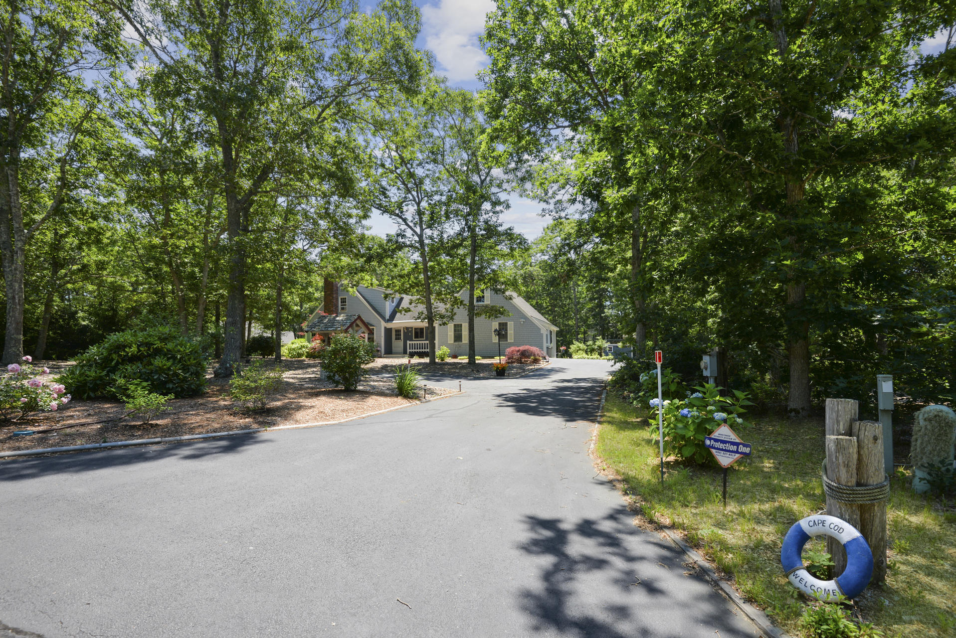 129 Oakwood Road Eastham, MA 02642 - Photo 6 of 30 a view of a table and chairs in patio