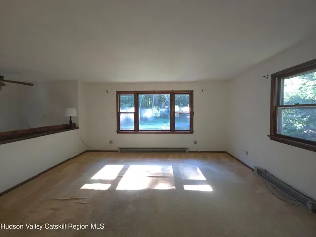 an empty room with windows