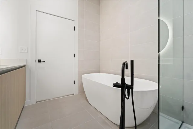 a bathroom with a shower and toilet