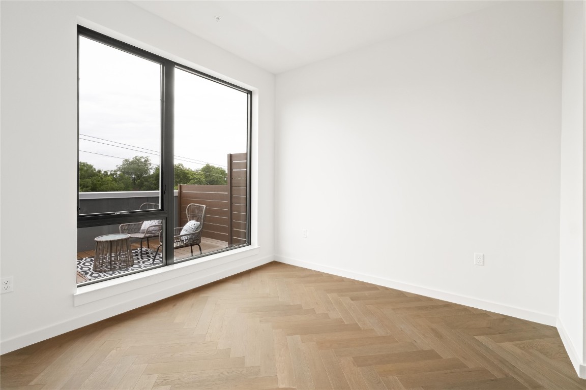 2209 South 1st Street, Unit 403 Austin, TX 78704 - Photo 16 of 40 a view of a room with sliding glass door