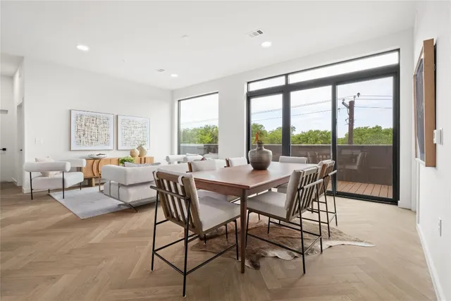 a kitchen with white cabinets and a stove