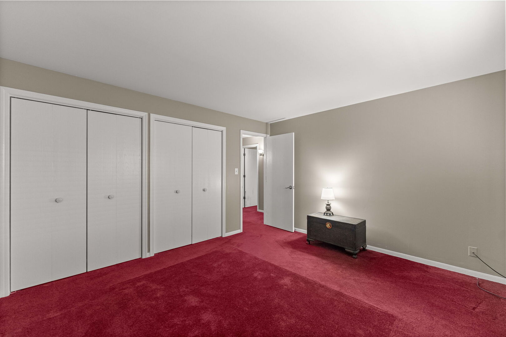 9122 South Pulaski Road, Unit 2E Oak Lawn, IL 60453 - Photo 12 of 16 a bed room with a bed and a window