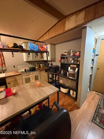 a living room with a couch and a flat screen tv