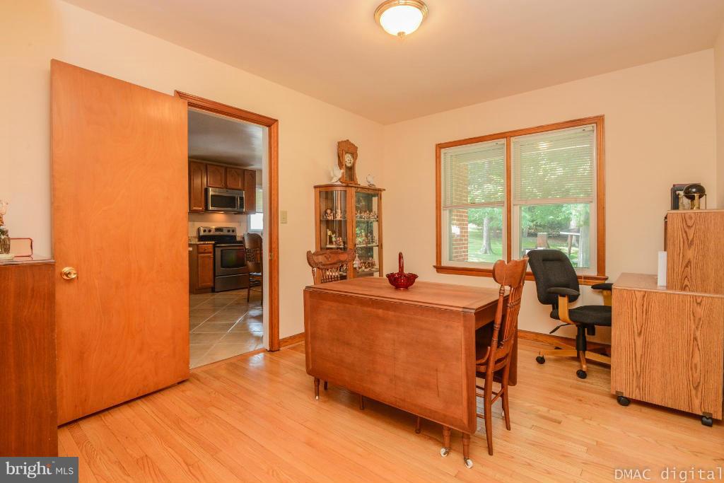 9030 Bethel Road Frederick, MD 21702 - Photo 13 of 28 a large living room with a large window