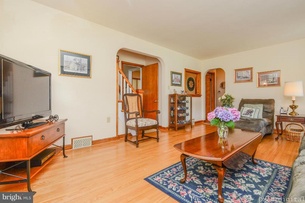 9030 Bethel Road Frederick, MD 21702 - Photo 5 of 28 a dining room with furniture and wooden floor