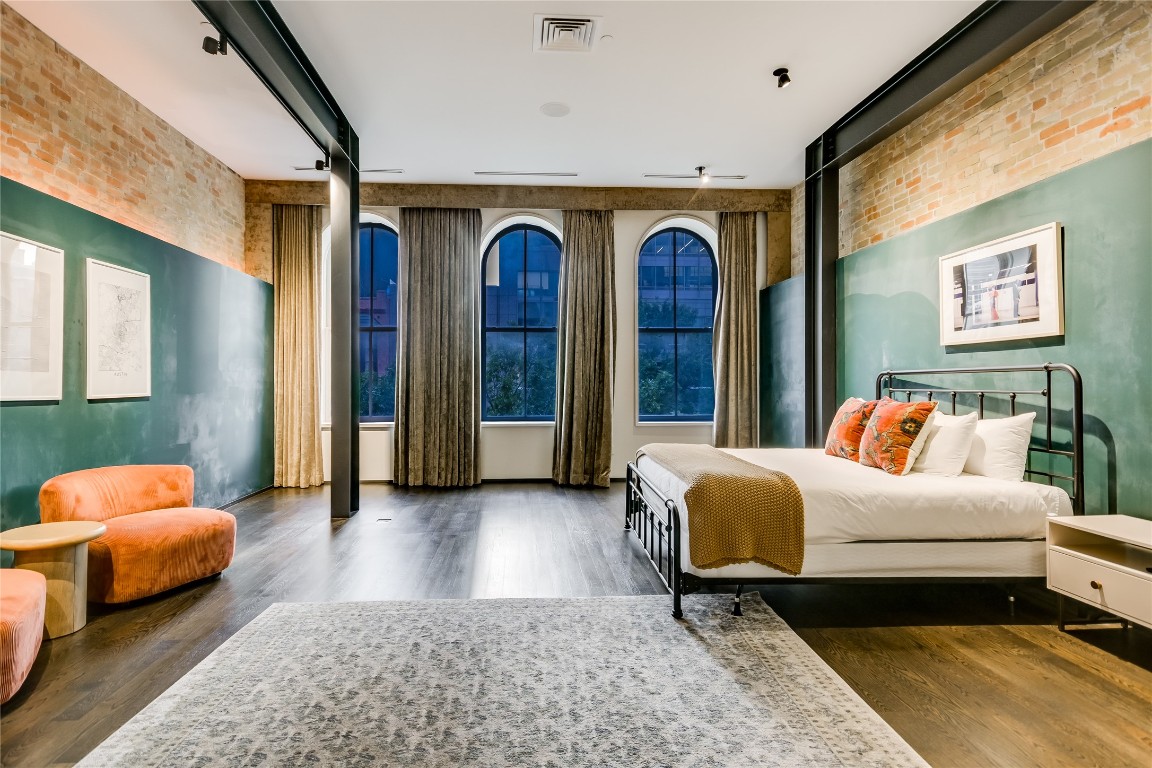 811 Congress Avenue Austin, TX 78701 - Photo 11 of 39 a bedroom with furniture and window