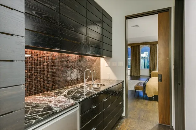 a kitchen with a stove and a cabinet