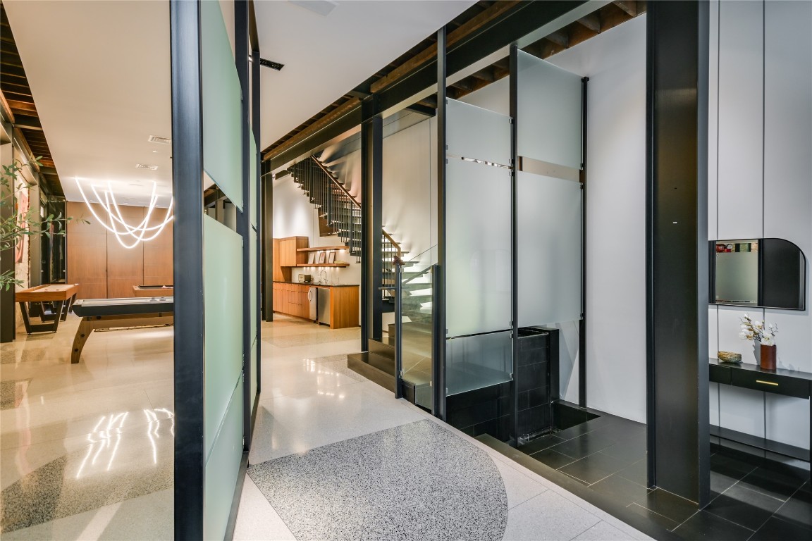 811 Congress Avenue Austin, TX 78701 - Photo 2 of 39 a view of a hallway with a living room