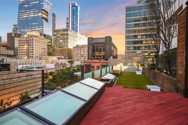 a outdoor space with patio the couches and a dining table with the ocean view