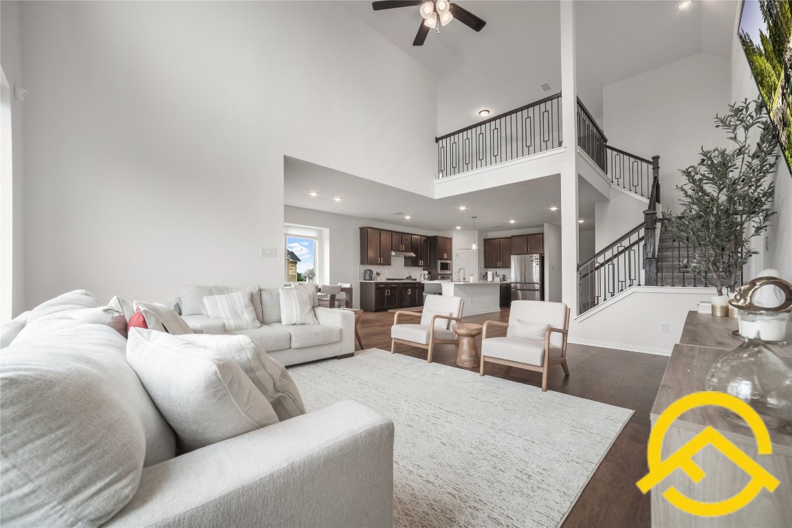 671 Durian Loop Buda, TX 78610 - Photo 10 of 29 a living room with furniture and a rug